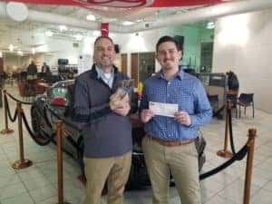 Pictured are John Moore, Used Car Manager at Andrew Toyota as well as Billy Zakrzewski of the Wisconsin Humane Society.
