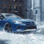 2020 blue toyota camry in rain