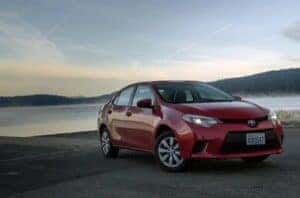 2015 Toyota Corolla next to a body of water