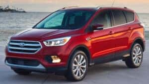 red 2017 ford escape parked by water