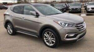 silver hyundai sante fe in parking lot 