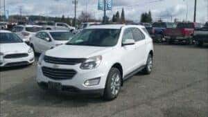 white chevy equinox in parking lot