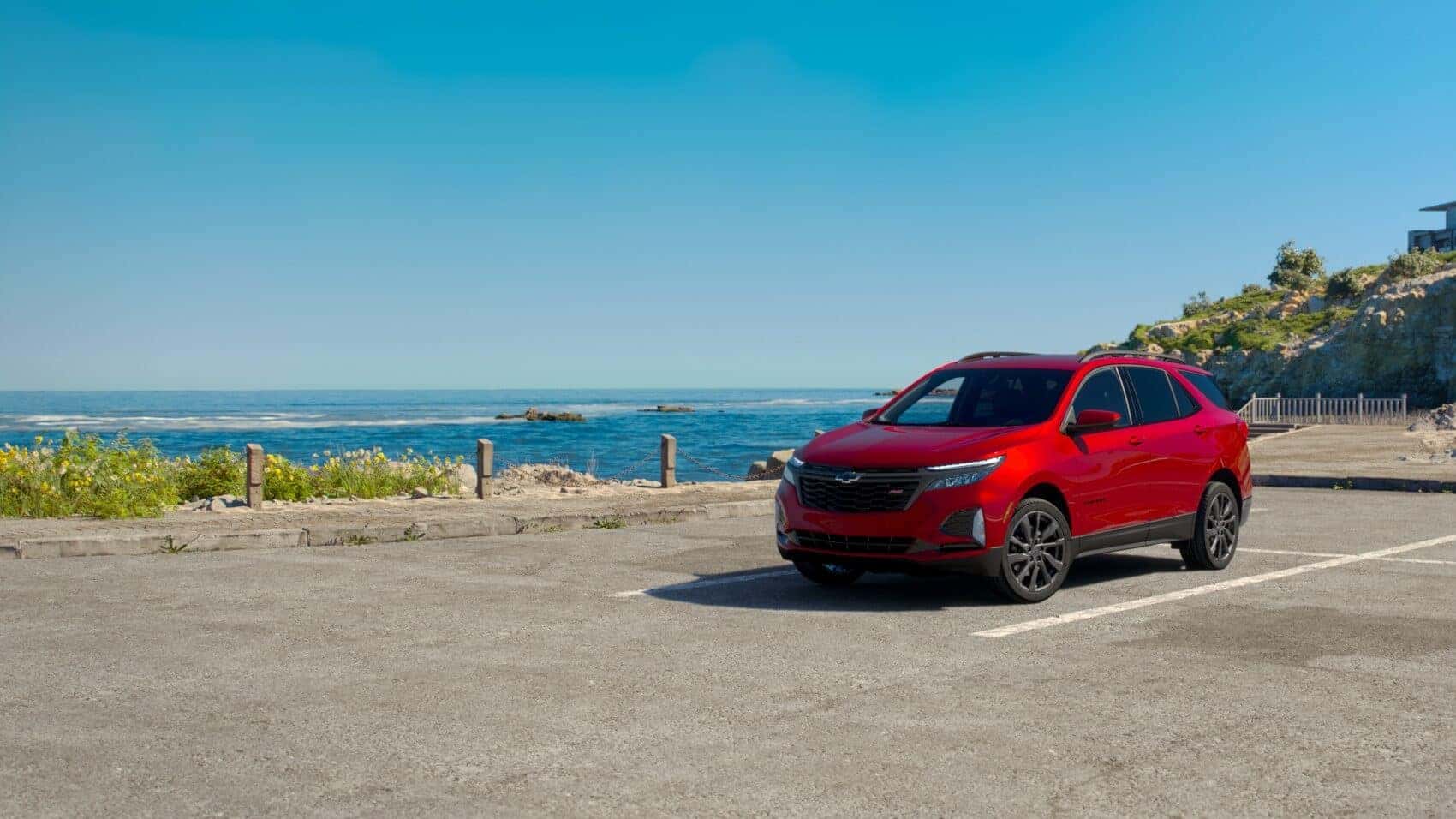 Chevrolet Equinox parked in a parking lot by the beach