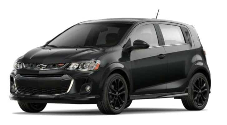 A black 2018 Chevy Sonic RS is angled left.