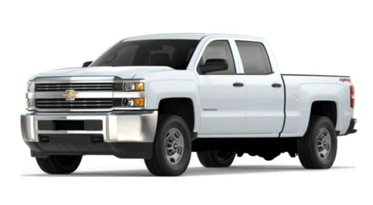A white 2019 Chevy Silverado 2500 HD is angled left.