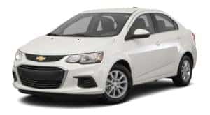 A white 2020 Chevy Sonic is facing left.