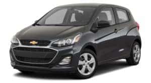 A black 2020 Chevy Spark is facing left.