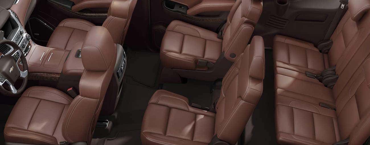 A view from above is shown of the brown interior in a 2020 Chevy Tahoe.