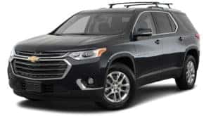 A black 2018 used Chevrolet Traverse is angled left on a white background.