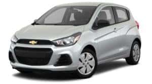 A silver 2018 used Chevy Spark is facing left.