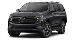 A black 2021 Chevy Tahoe RST is angled left.