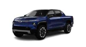 A blue 2024 Chevy Silverado EV is facing left.