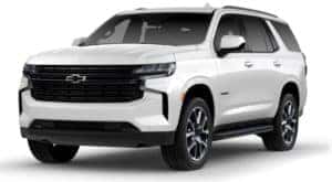 A white 2023 Chevy Tahoe RST is shown angled left.