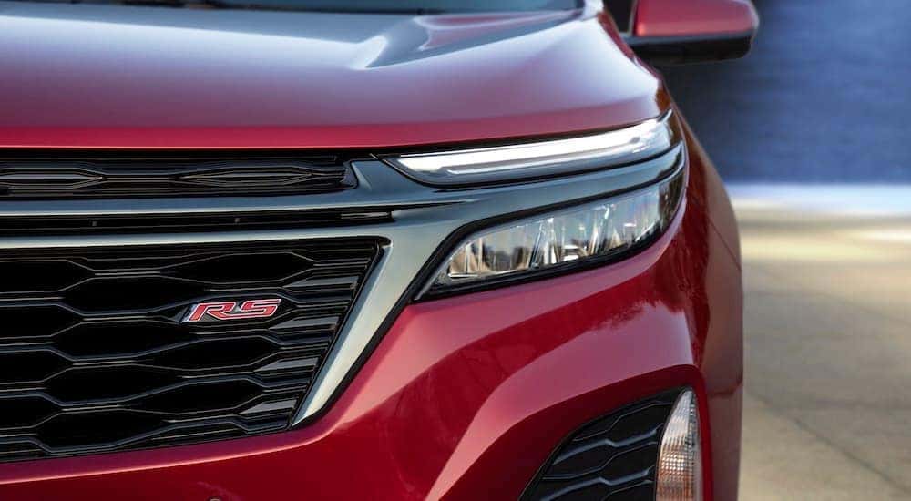 A close up shows the driver side headlight on a 2022 Chevy Equinox RS.