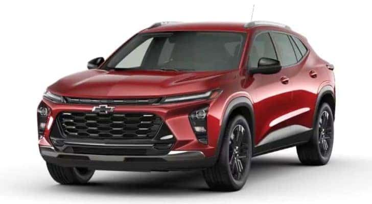 A red 2024 Chevy Trax is shown angled left.