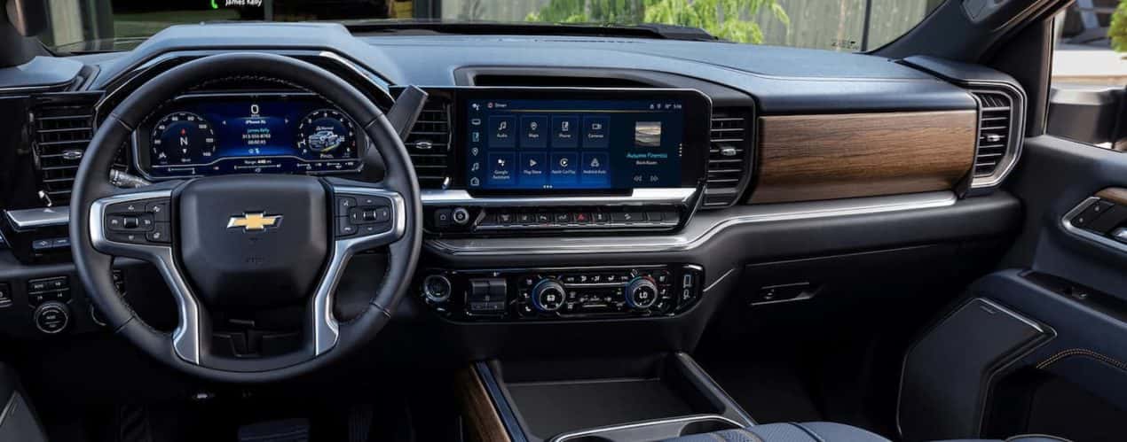 The black and brown dashboard of a 2024 Chevy Silverado 3500 HD is shown.
