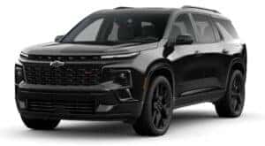 A black 2024 Chevy Traverse RS is angled left.