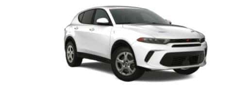 A white 2024 Dodge Hornet is angled right.