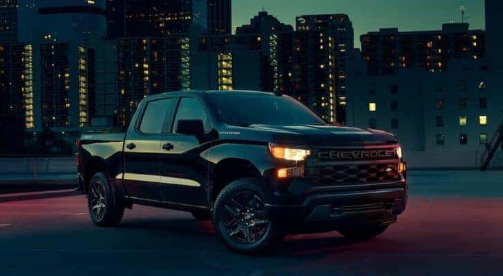 A black 2023 Chevy Silverado 1500 for sale near McCordsville is shown from the front at an angle.