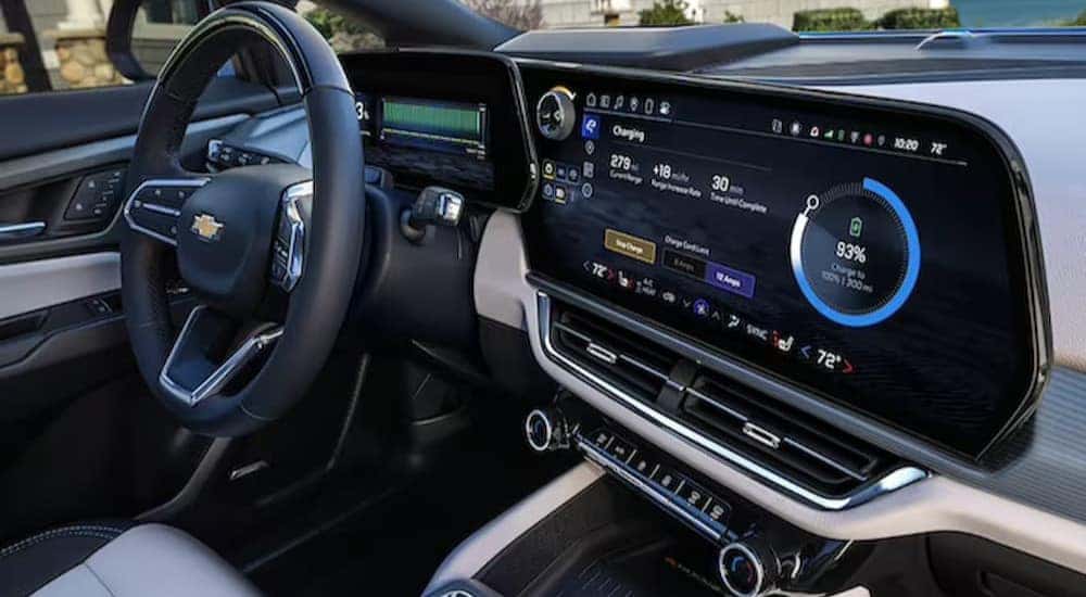 The black and white interior and dash in a 2024 Chevy Equinox EV is shown.