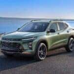 A green 2024 Chevy Trax ACTIV is shown from the front at an angle.