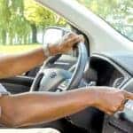 Driver using Ford Sync Features