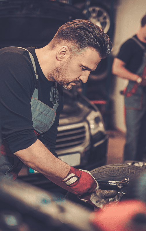 Mechanic fixing car