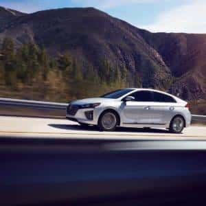 Hyundai Ioniq driving up a sloped road
