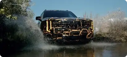2027 Kia Telluride driving through shallow water
