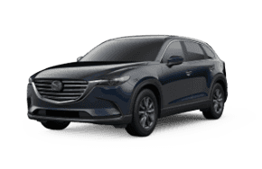 2021 Mazda CX-9 Sport in the color Deep Crystal Blue Mica.