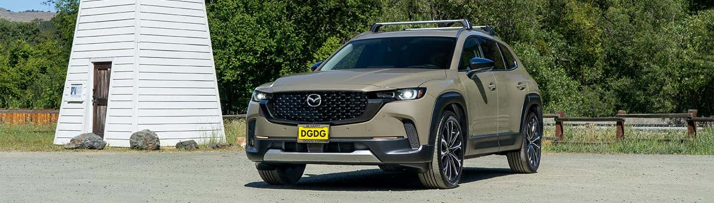 2023 Mazda CX-50 parked in front of a building.