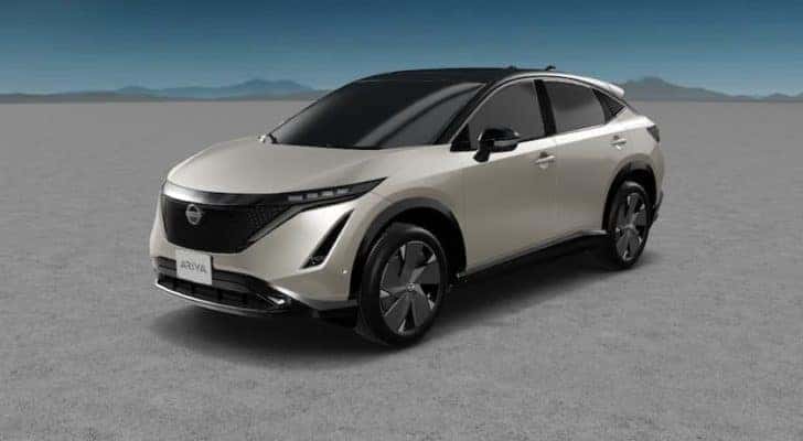 A silver 2022 Nissan Ariya is angled left.