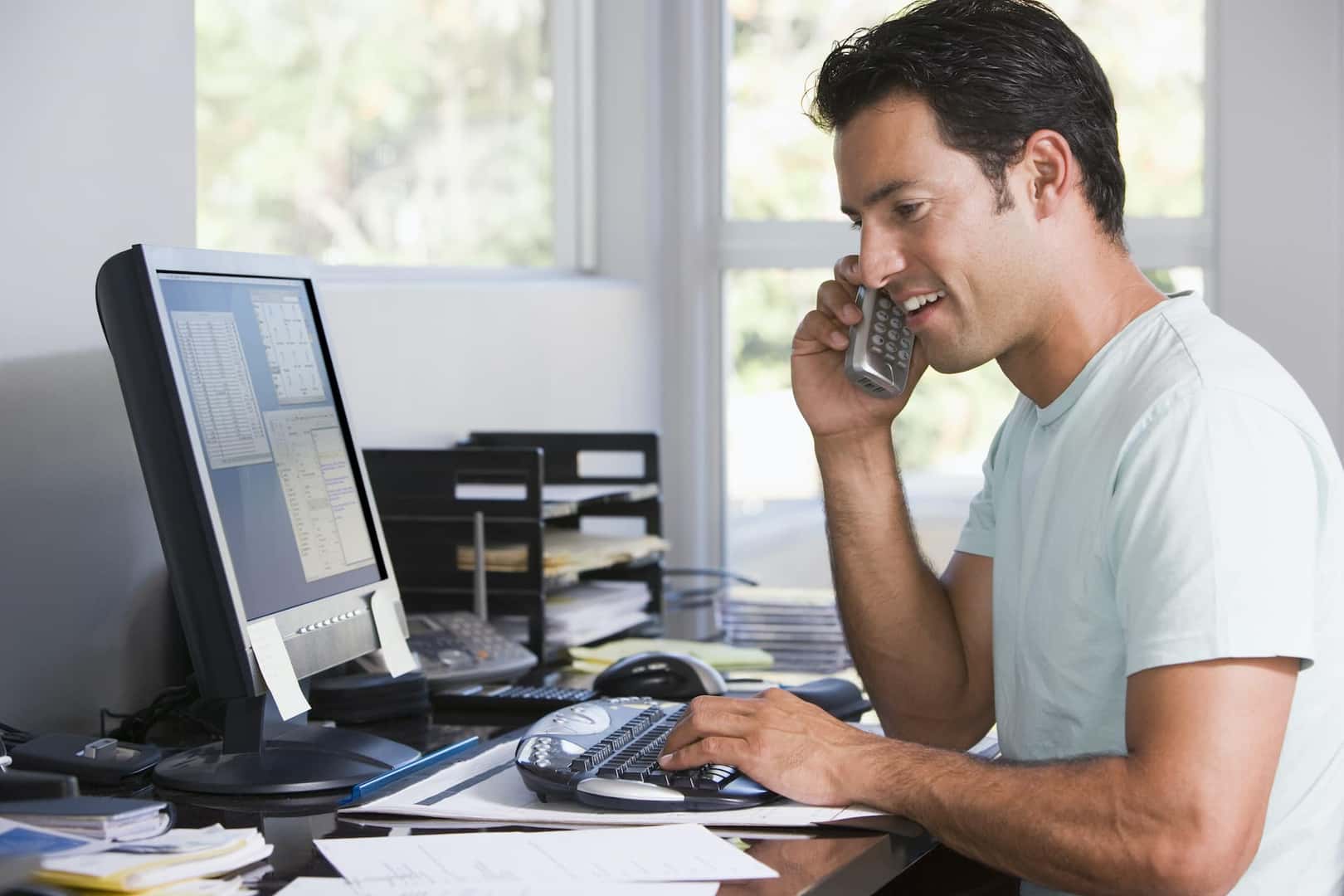 Man on the Phone in Home Office