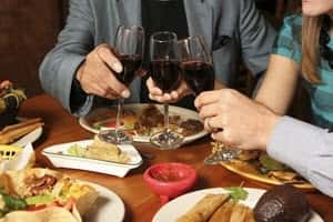 Drinking wine and eating food