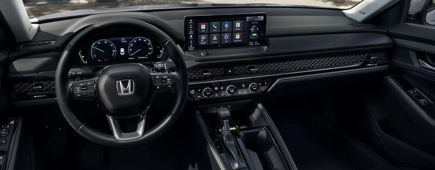 The black interior and dash in a 2024 Honda Accord is shown.