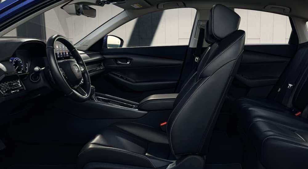 The black interior and dash in a 2024 Honda Accord is shown.