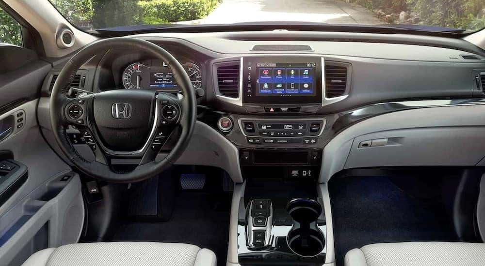 The interior of a 2025 Honda Ridgeline for sale is shown from above the center console.