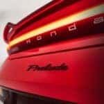 The close-up of the rear end is shown on a red 2026 Honda Prelude.