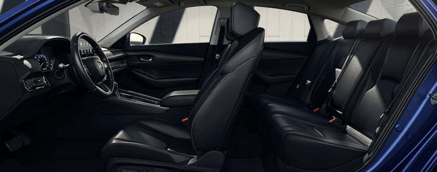 Side angle view of a black 2023 Honda Accord.