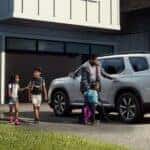 A white 2025 Honda Pilot Touring parked for sale in Oklahoma City