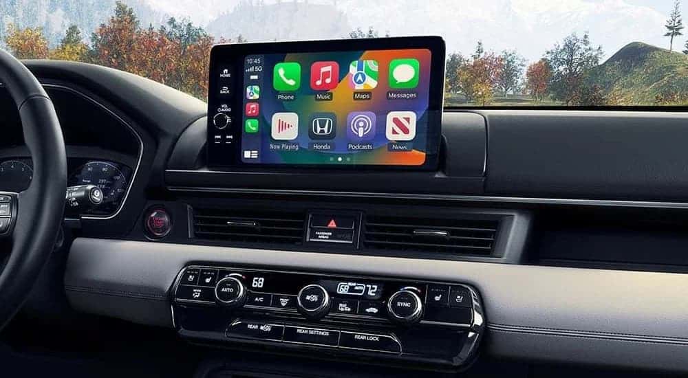 Infotainment and digital gauge cluster on a 2025 Honda Pilot