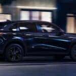 A black 2026 Honda HR-V driving at night.