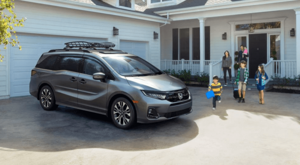 Silver 2026 Honda Odyssey parked in a driveway