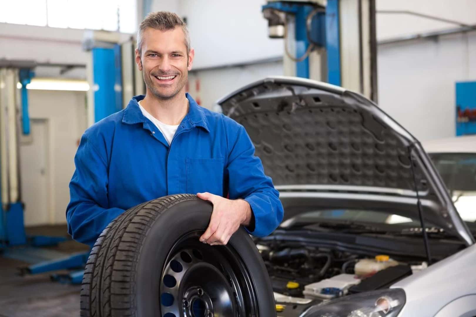 Man holding tire