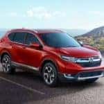 Red 2018 Honda CR-V in front of mountains