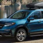 Blue 2019 Honda Pilot near lake