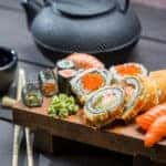 Closeup of fresh sushi on wooden board