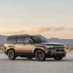 A Santa Fe Hybrid vehicle with a mountain background