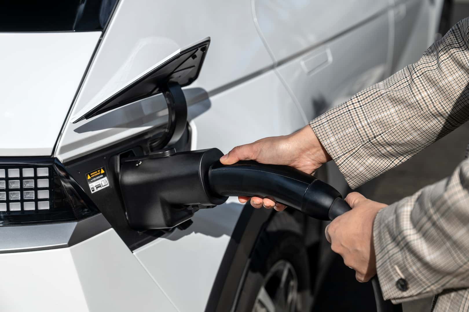 The Hyundai NACS adapter plugged into a 2024 Hyundai IONIQ 5