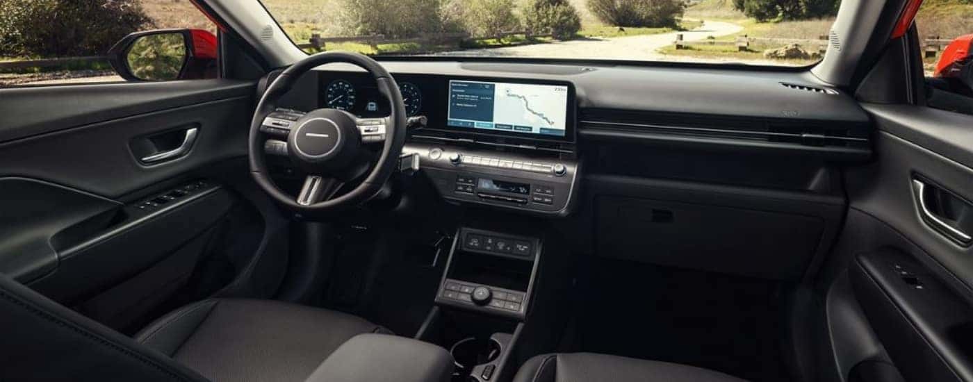 The black interior of a 2025 Hyundai KONA is shown.